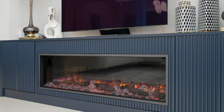 Blue slatted media wall unit with inset electric fire and television