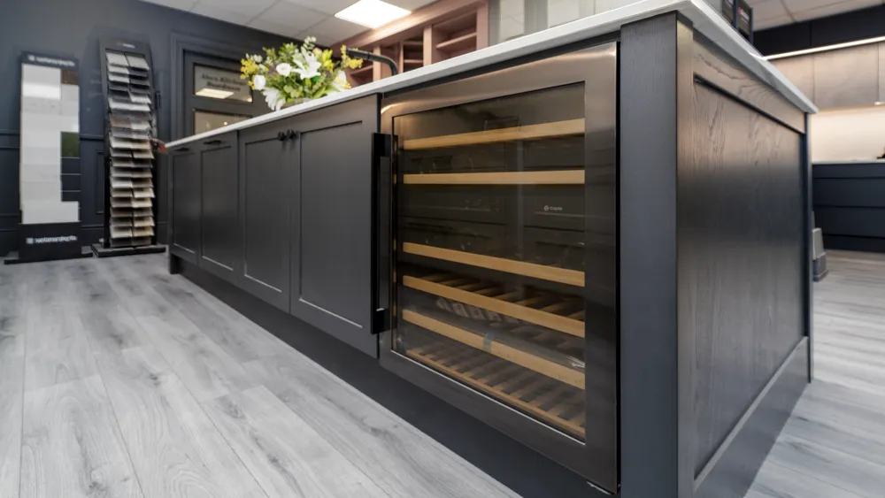Charcoal kitchen island with integrated glass fronted wine cooler