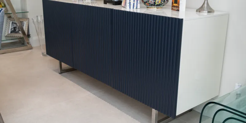 Navy fluted sideboard with white gloss ends and chrome legs