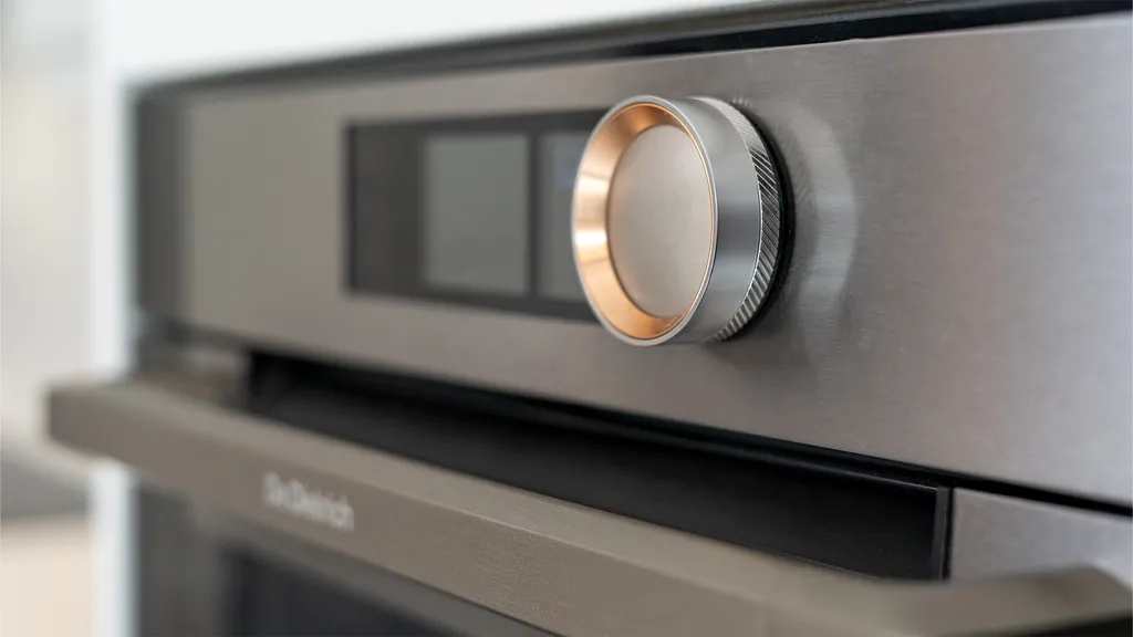 Copper trimmed control dial on a De Dietrich oven