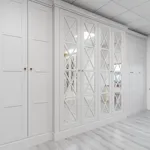 Pale grey shaker wardrobes with mirrored cross panel doors