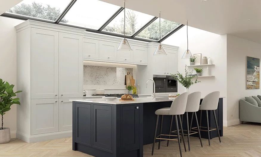 White shaker kitchen with navy island and bar stools beneath a glazed roof
